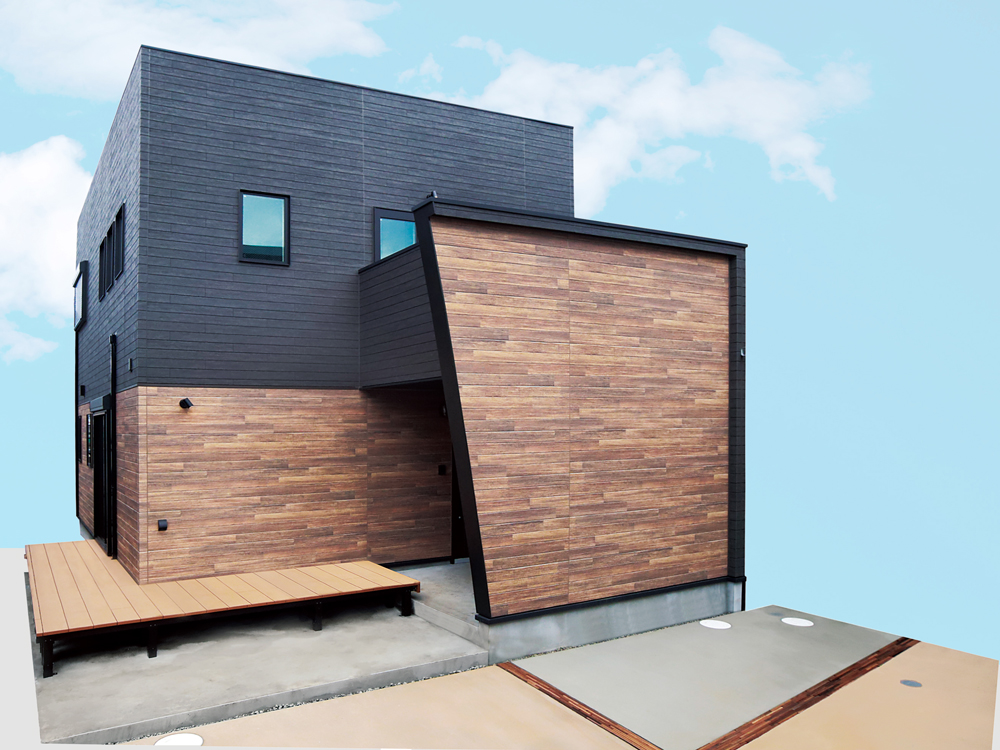 ブラック系でツートンカラーの四角い家